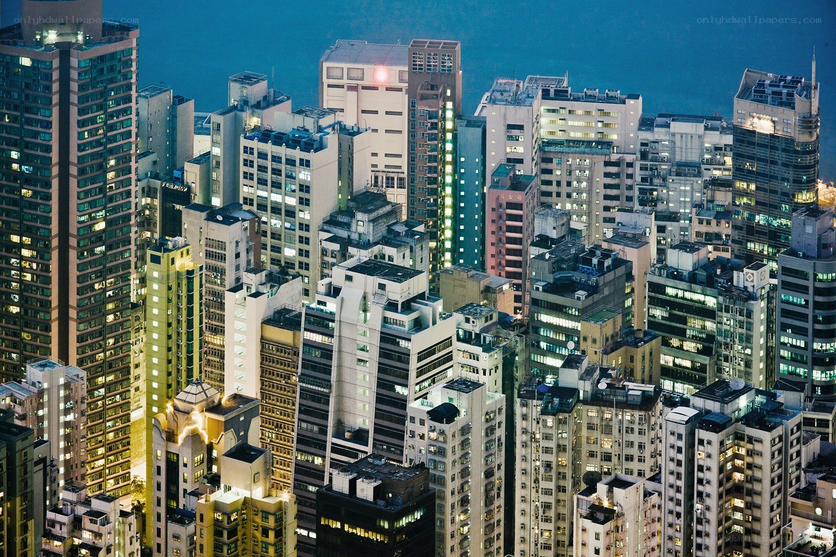 dense city skyline at dusk