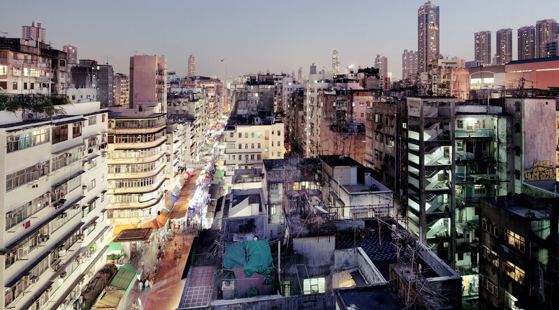 Dense urban alley at dusk