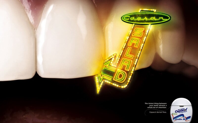 dental floss ad with neon sign