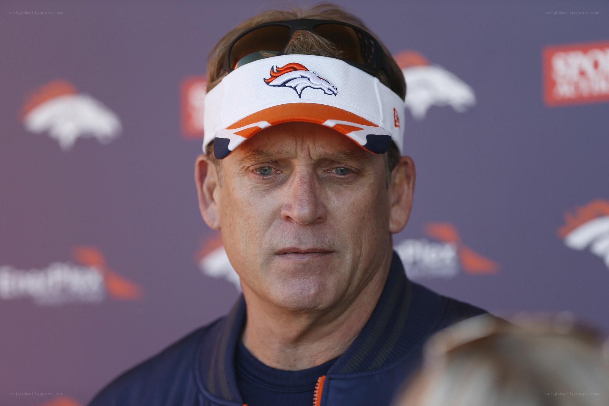 Denver Broncos coach at press event