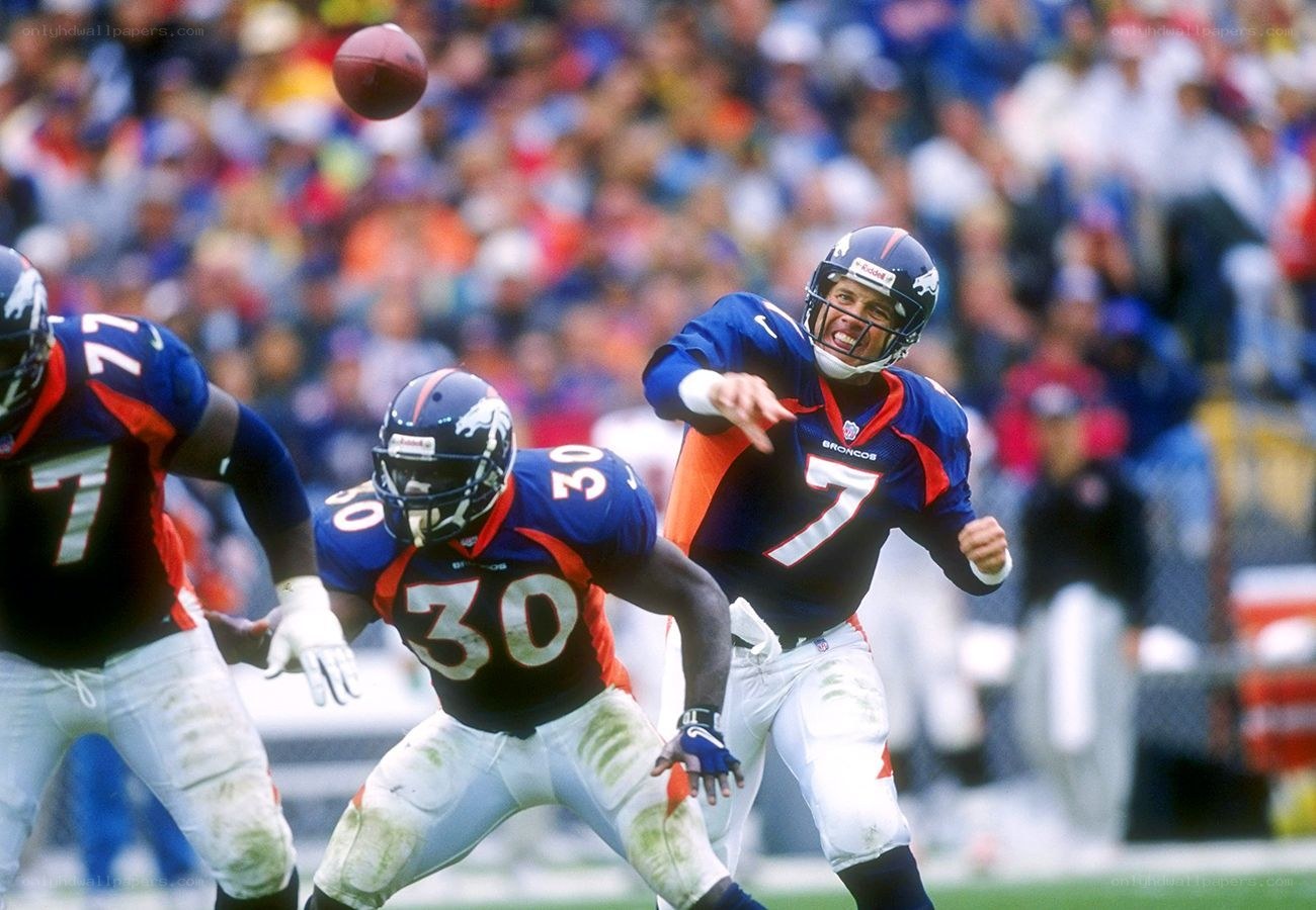 Denver Broncos players in action