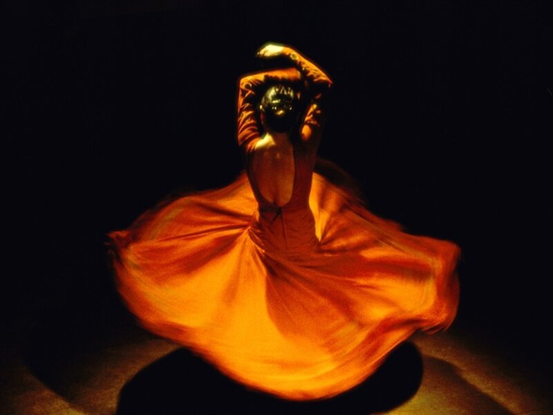Dervish Spinning in Orange Robe