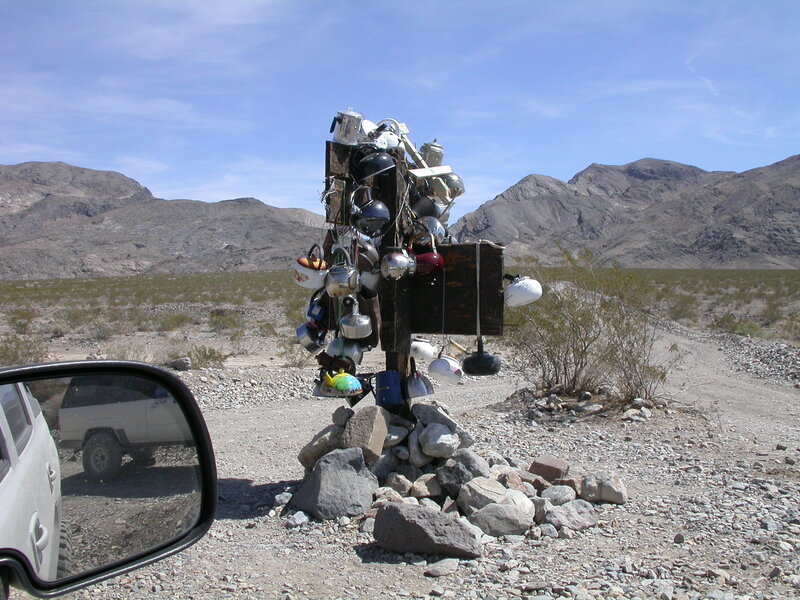 Desert art installation with kitchenware