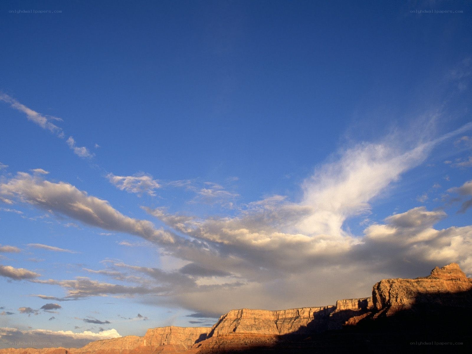 Desert canyon under blue sky