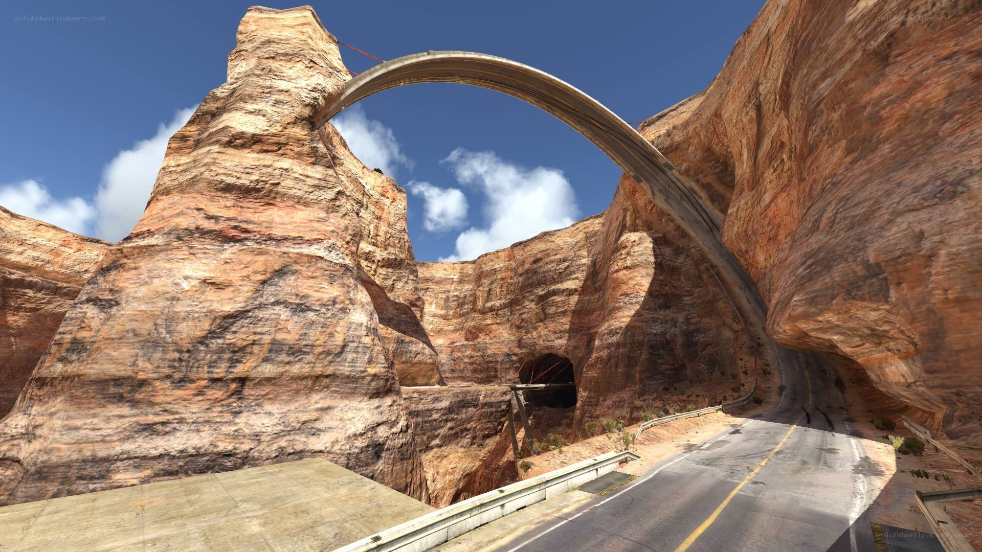 Desert canyon with arch bridge