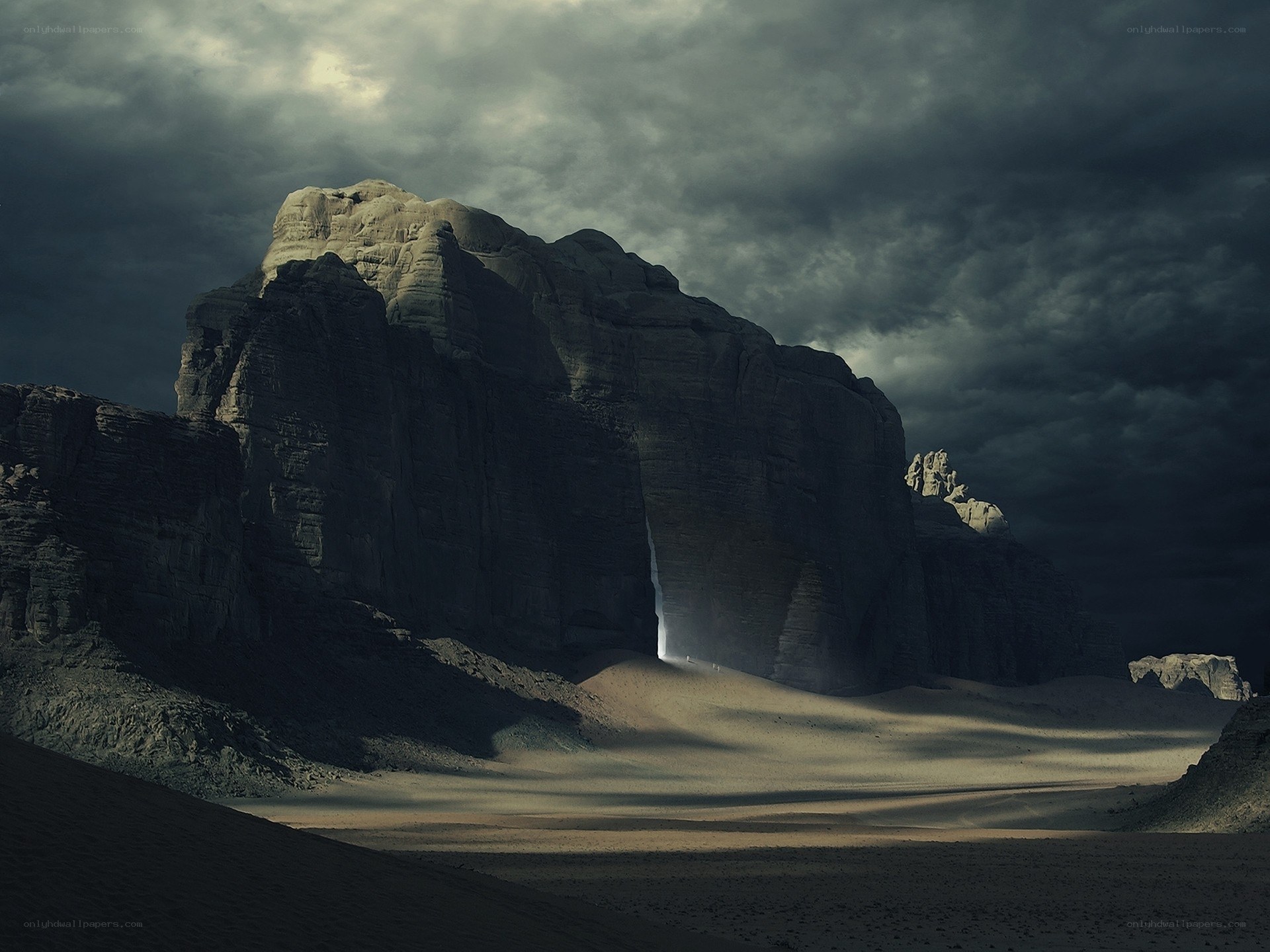Desert canyon with light beam