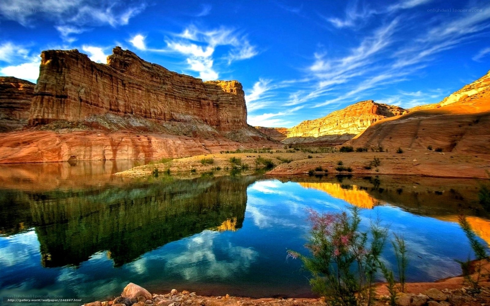 Desert canyon with reflective water