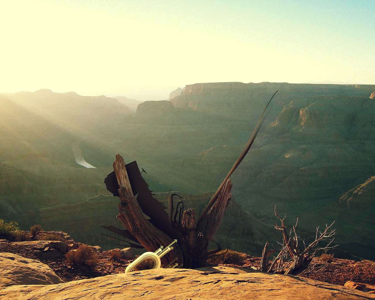 Desert canyon with sculpture