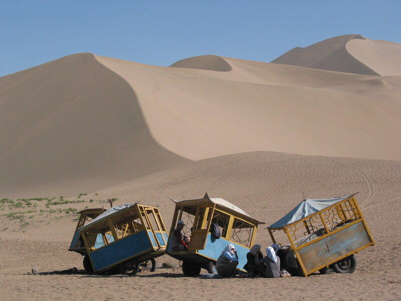 Desert carts and travelers