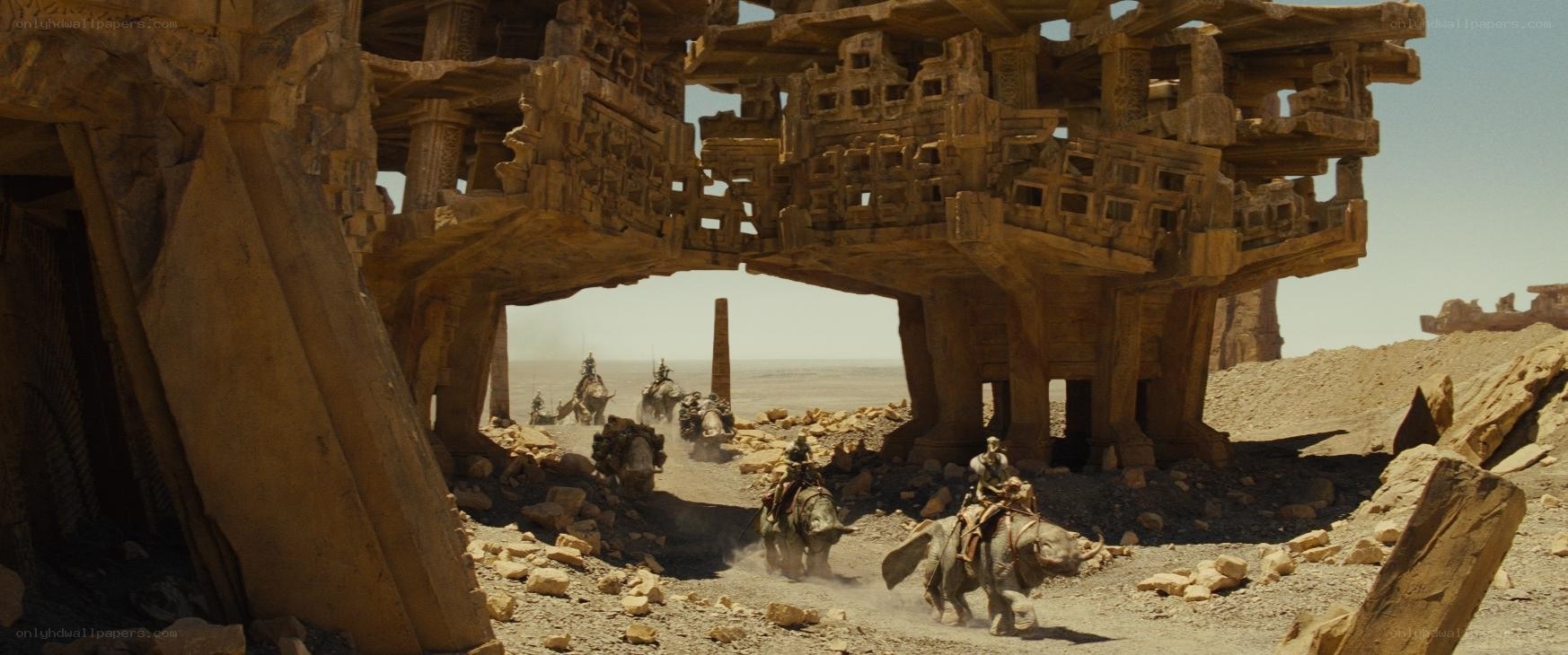Desert convoy through ruins