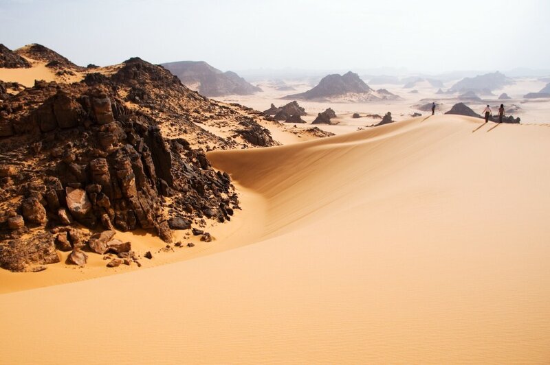 Desert dunes and rock formations
