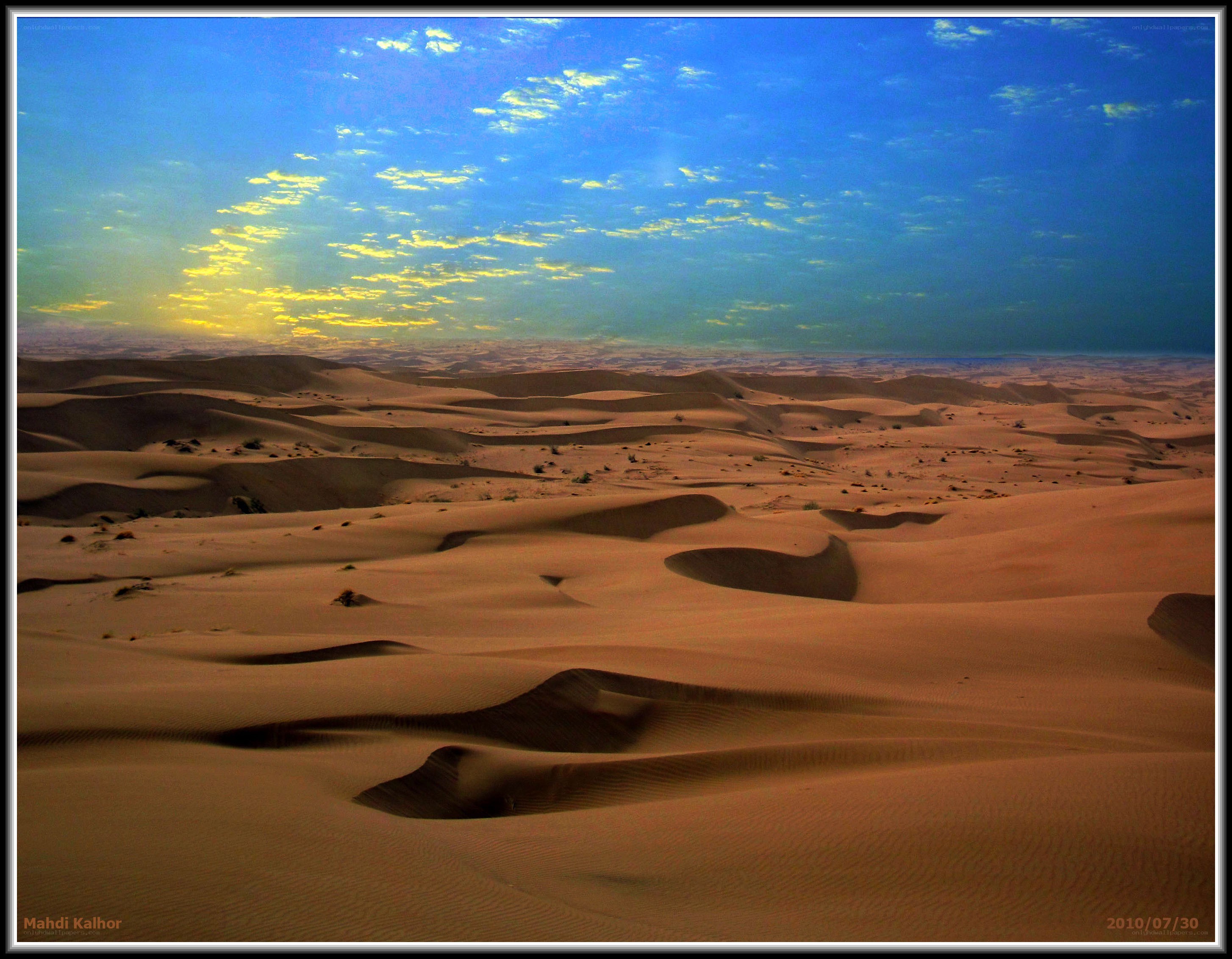 Desert dunes at sunrise