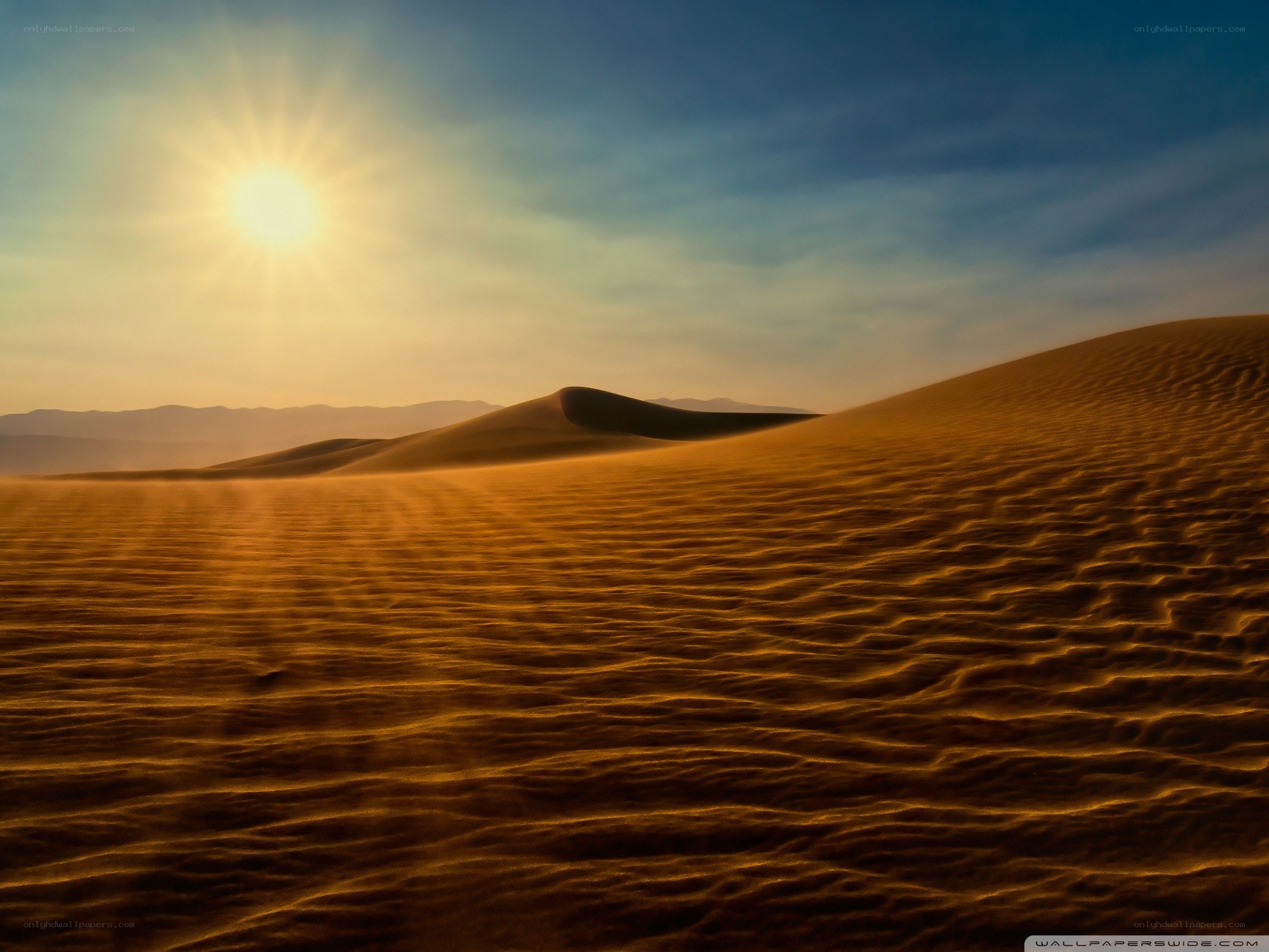 Desert dunes at sunrise