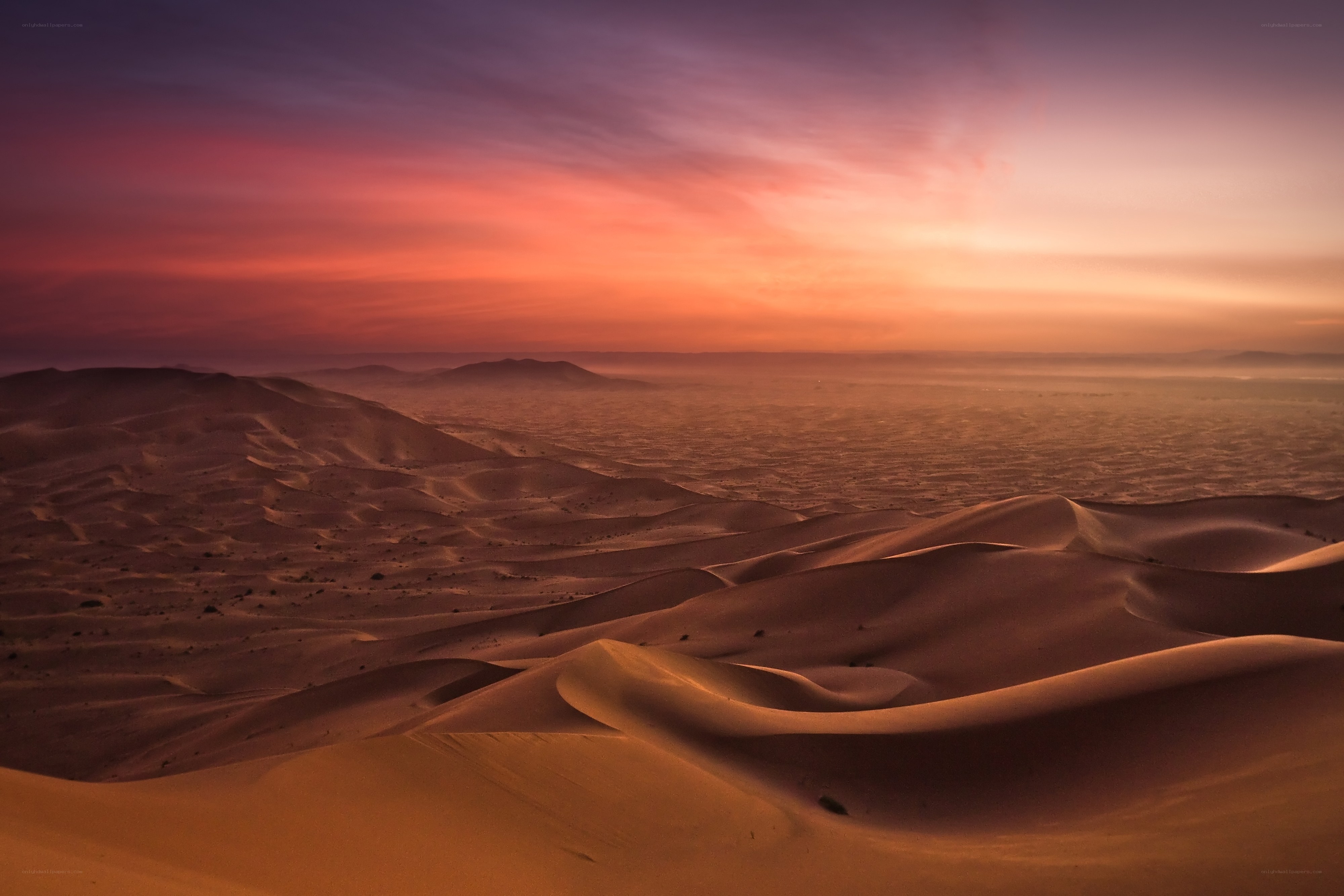 Desert dunes at sunset