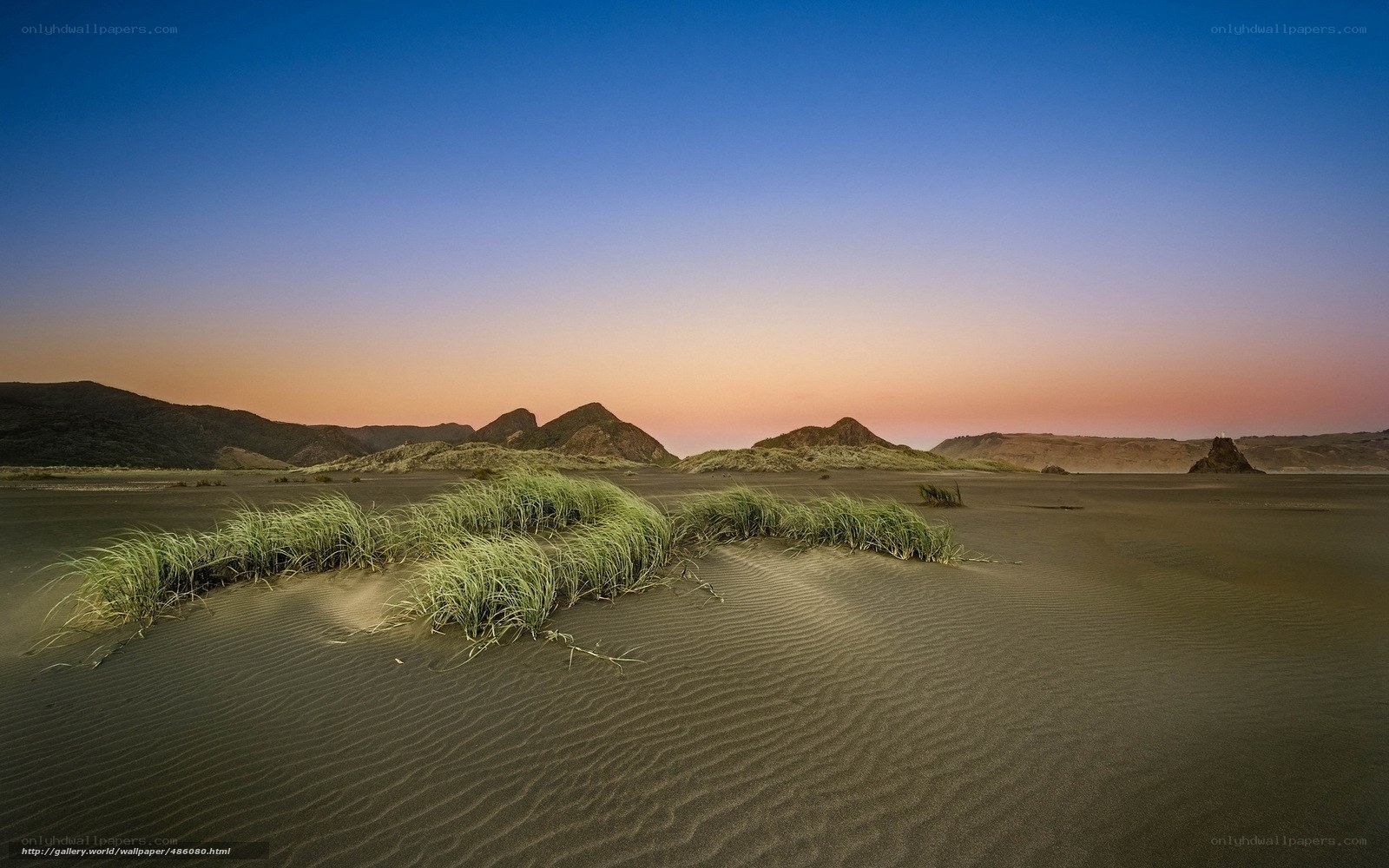 Desert dunes at sunset