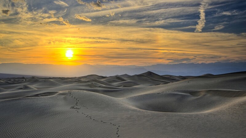 Desert dunes at sunset