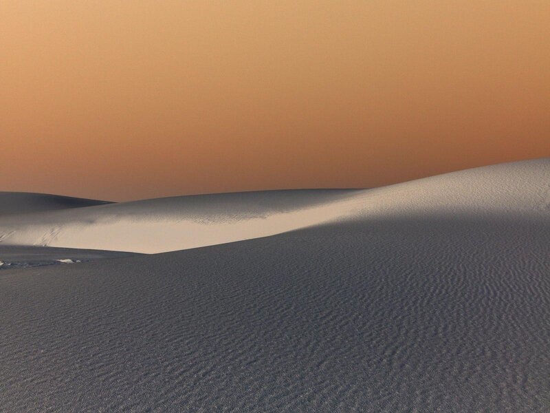 Desert dunes at sunset