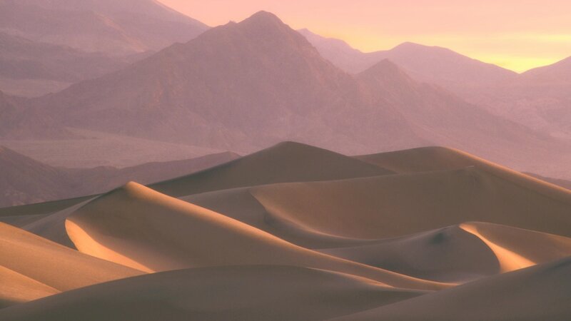 Desert dunes at sunset
