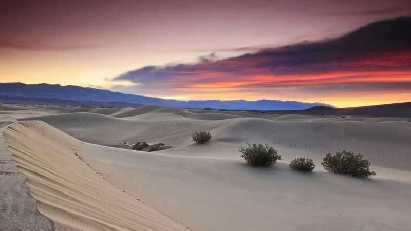 Desert dunes at sunset
