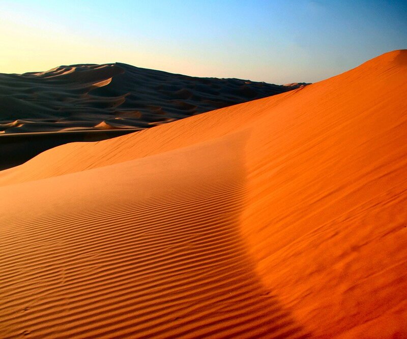 Desert dunes at sunset