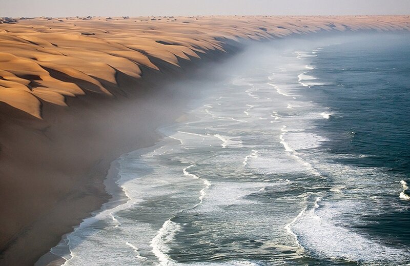 Desert dunes meet ocean waves