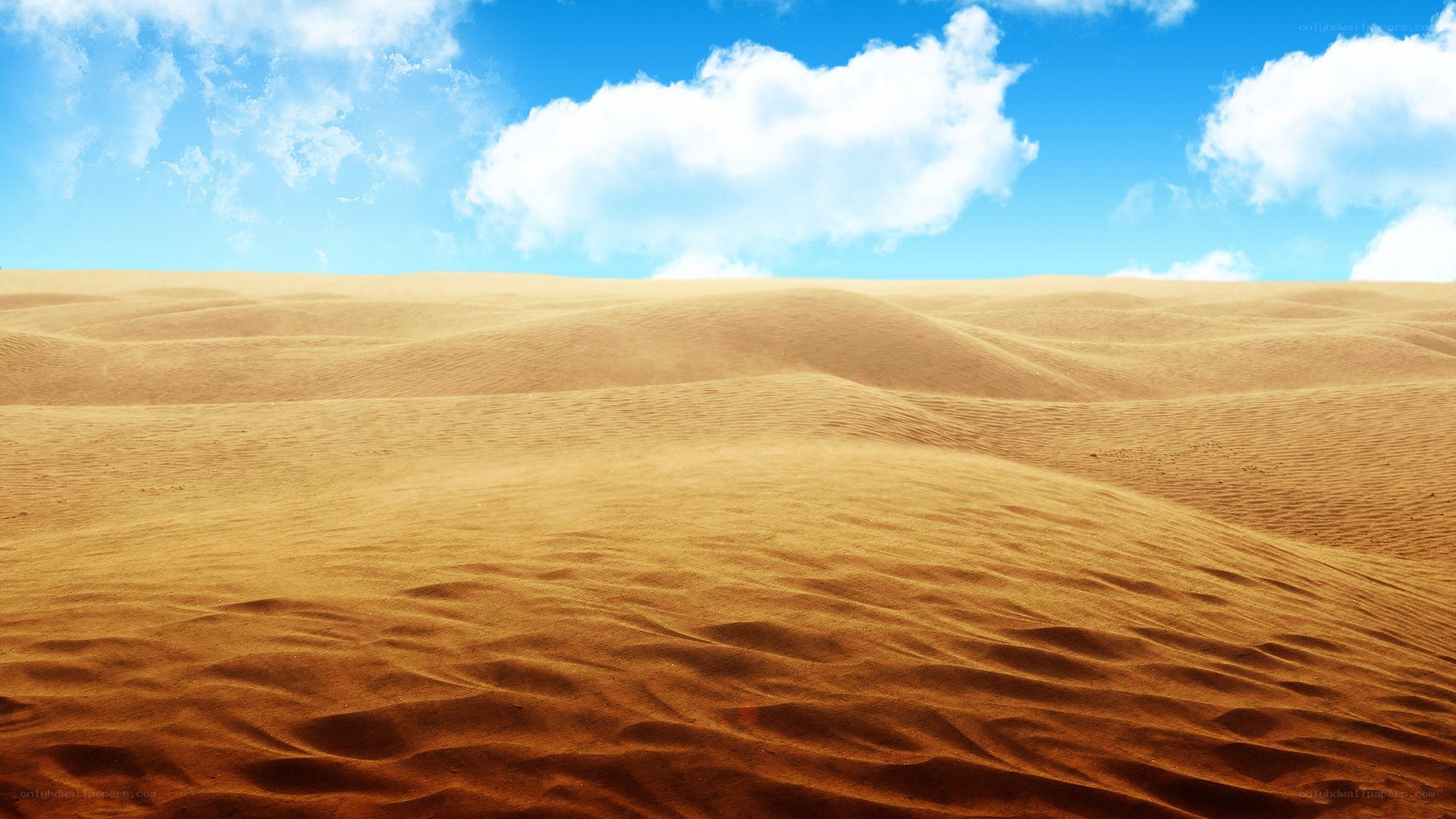 Desert dunes under blue sky