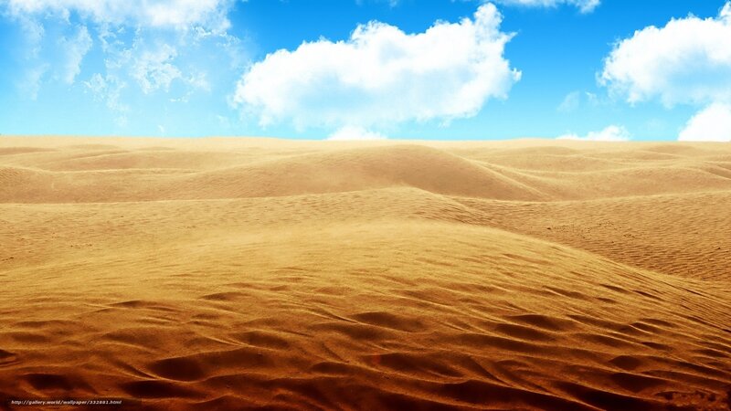 Desert dunes under blue sky