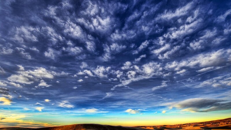Desert Dunes under Cloudy Sky — Blue
