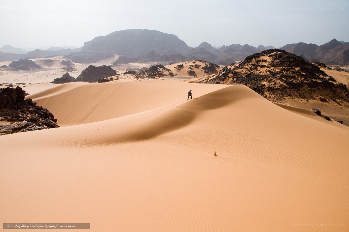 Desert dunes with hiker