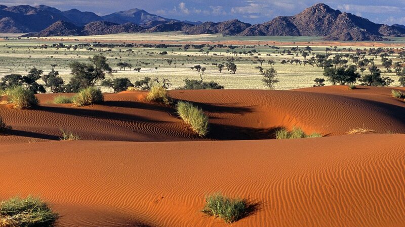 desert dunes with mountains