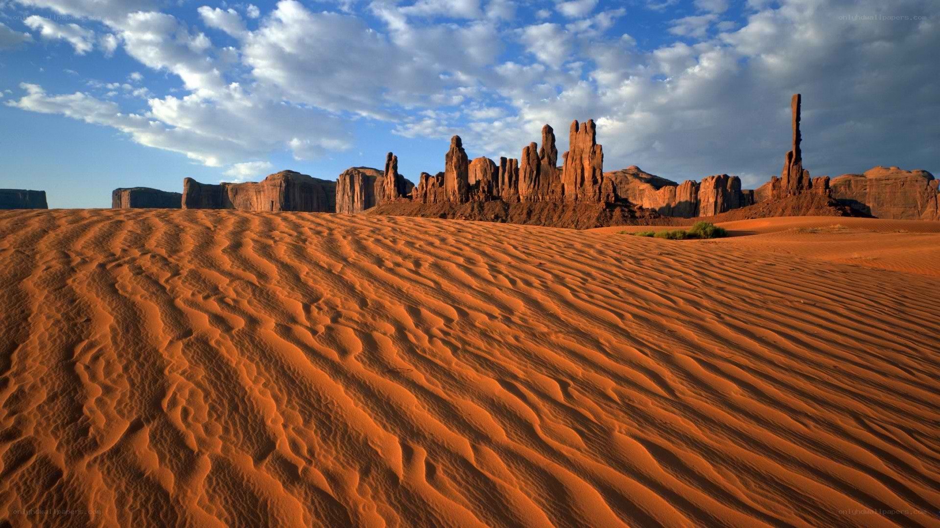 Desert dunes with rock formations