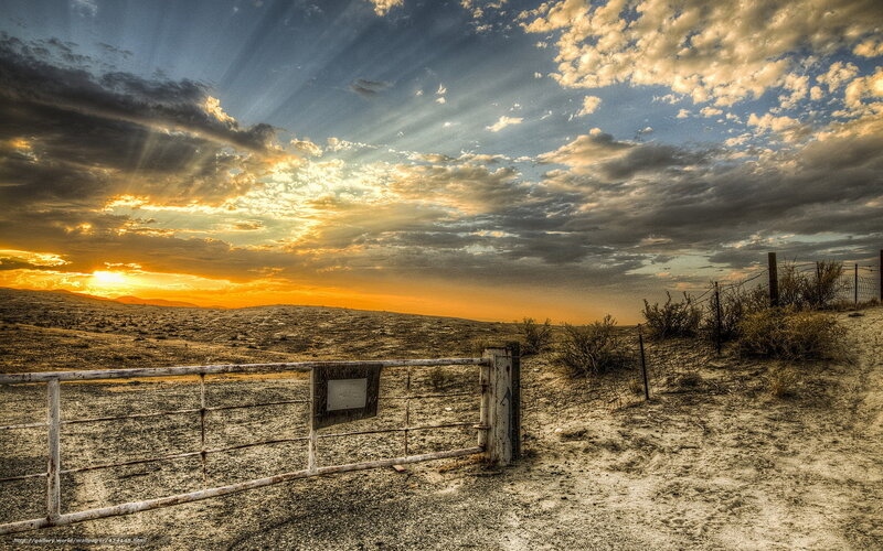 Desert gate at sunset