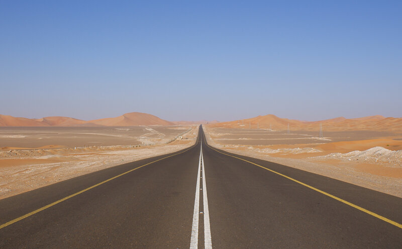 Desert highway stretching into the distance