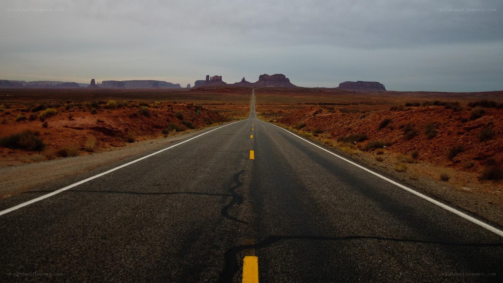 Desert highway to rock formations