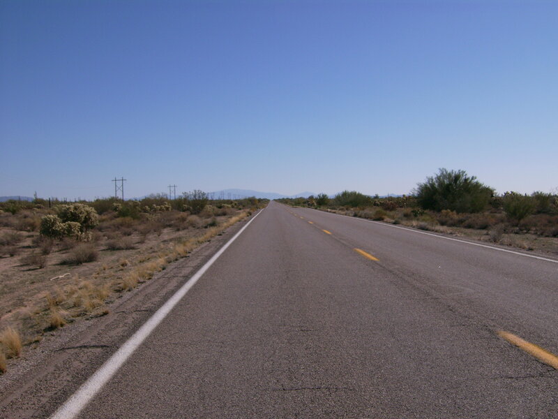 Desert highway under clear sky