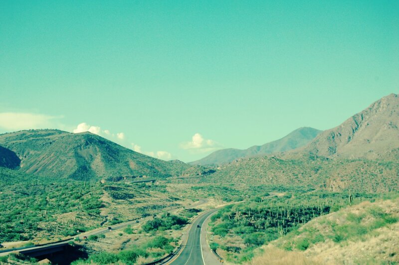 Desert highway with mountains
