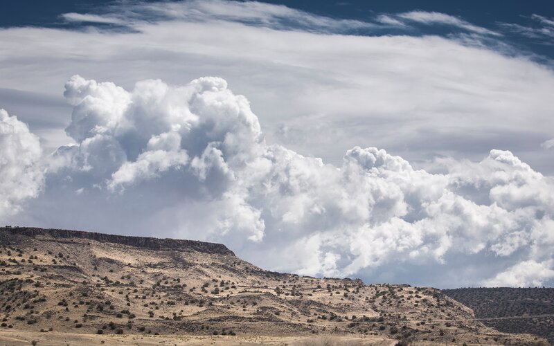 Desert Hills under Clouds