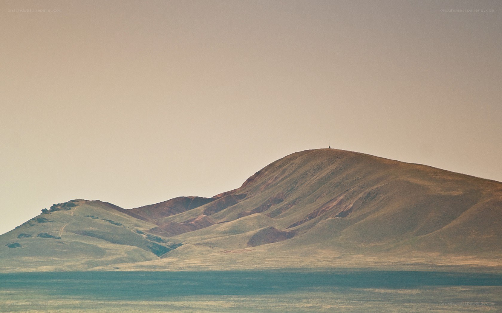 Desert hills under hazy sky