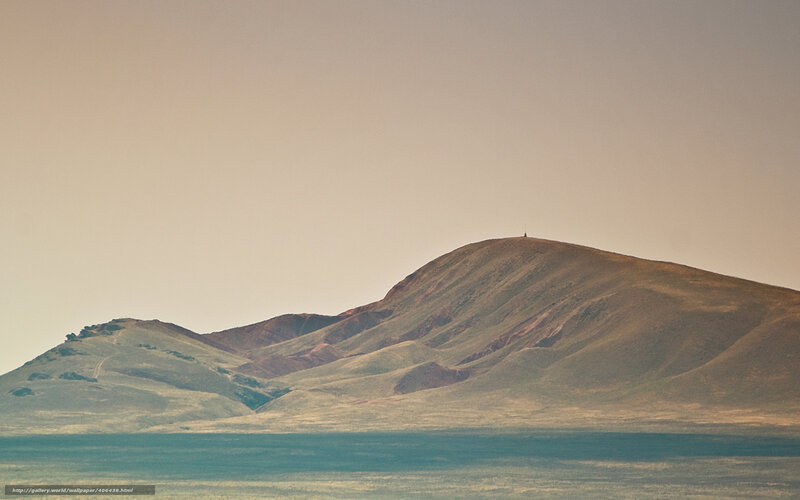 Desert hills under hazy sky