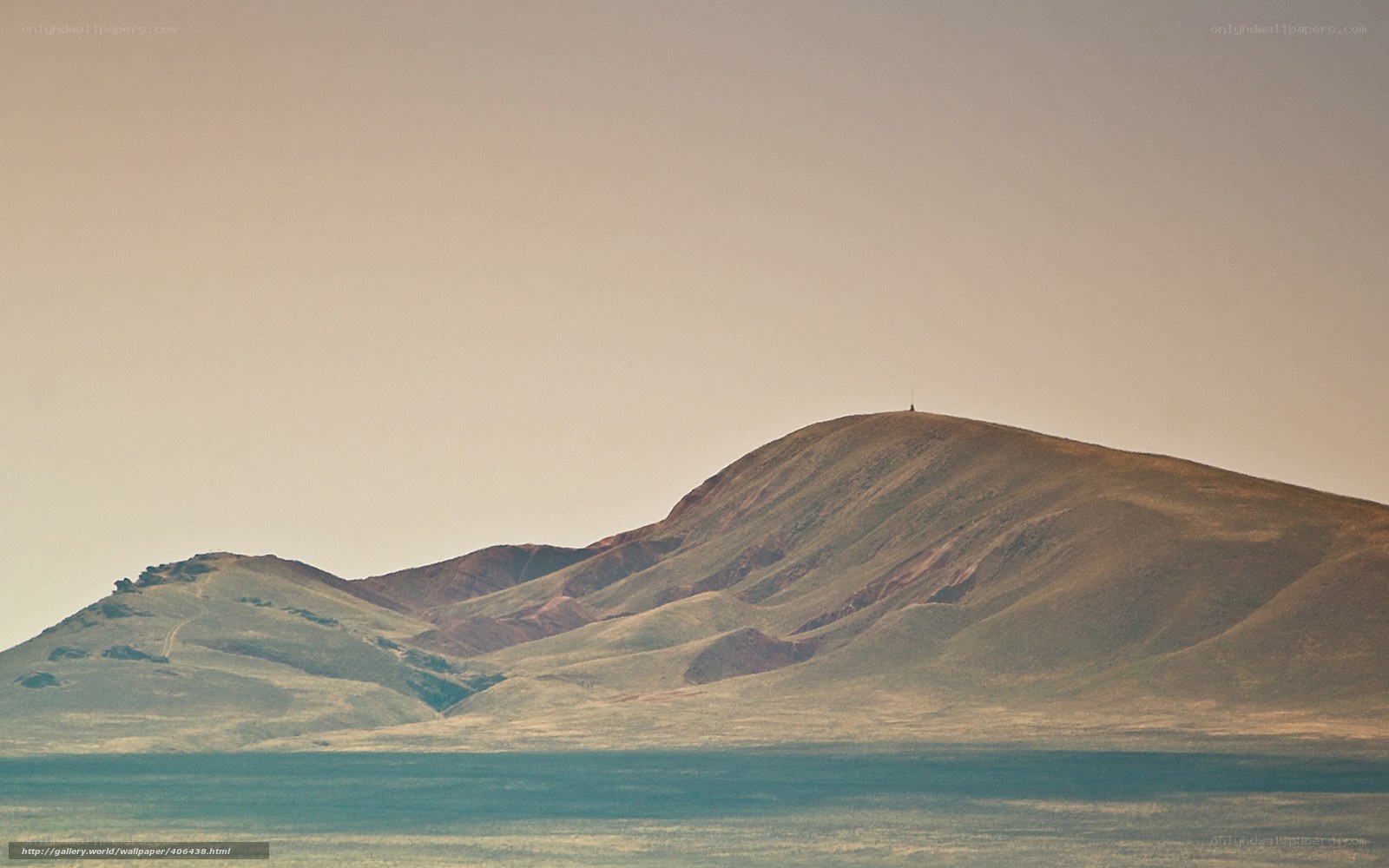 Desert hills under hazy sky