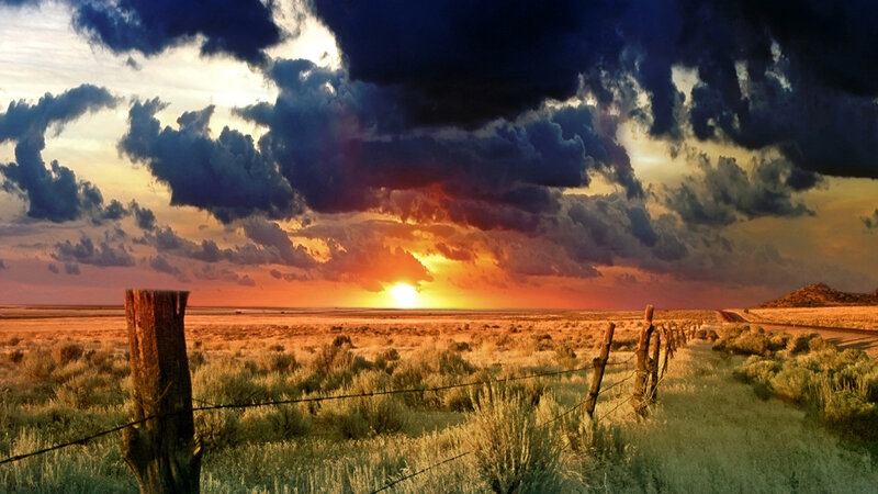 Desert Landscape at Sunset — Orange, Dramatic, Photograph, Fence, Clouds, Sun, Road, Blue
