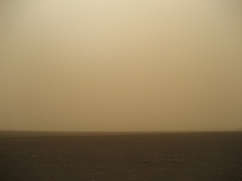 Desert landscape during sandstorm