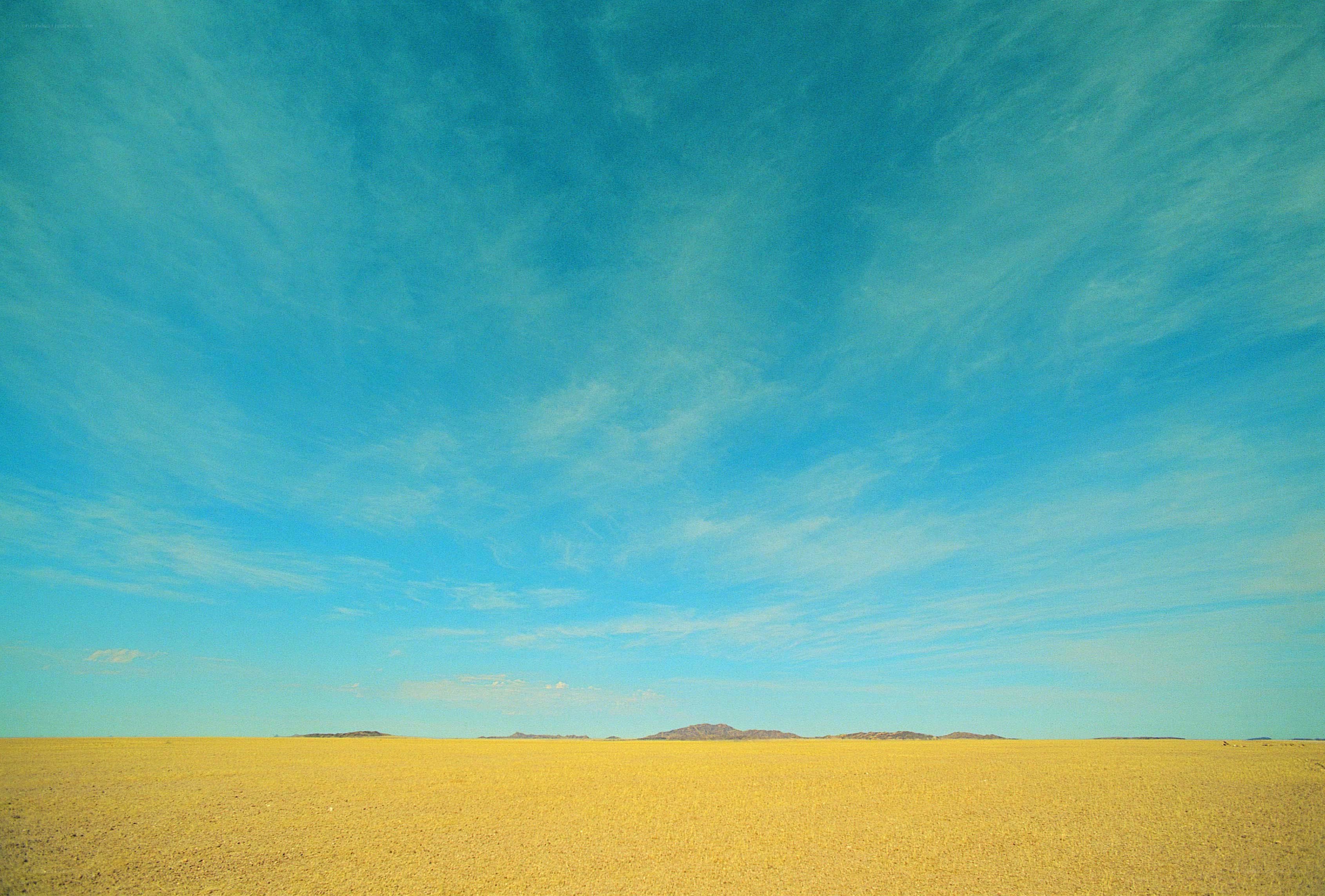Desert landscape under blue sky