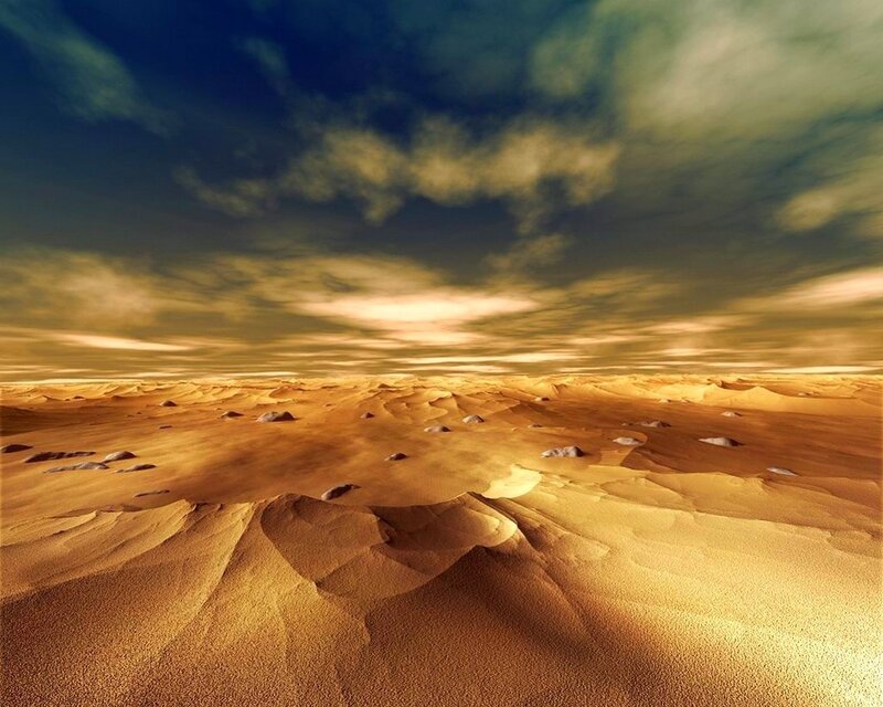 Desert landscape under dramatic sky