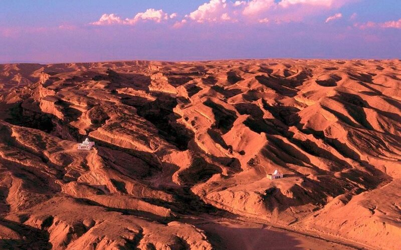 desert landscape with buildings