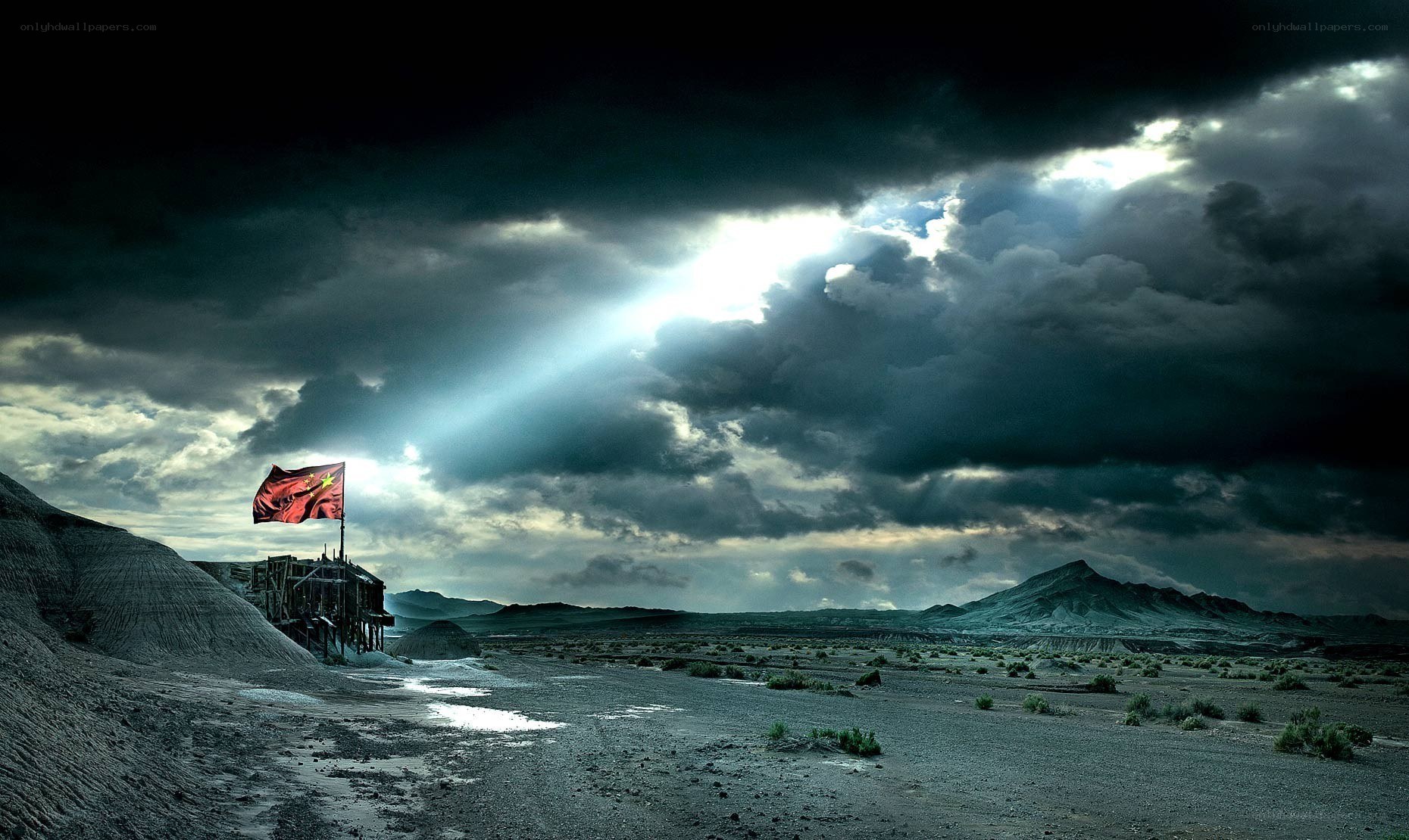 Desert landscape with Chinese flag