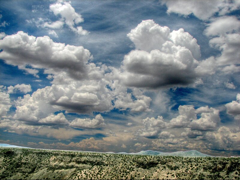Desert landscape with cloudy sky