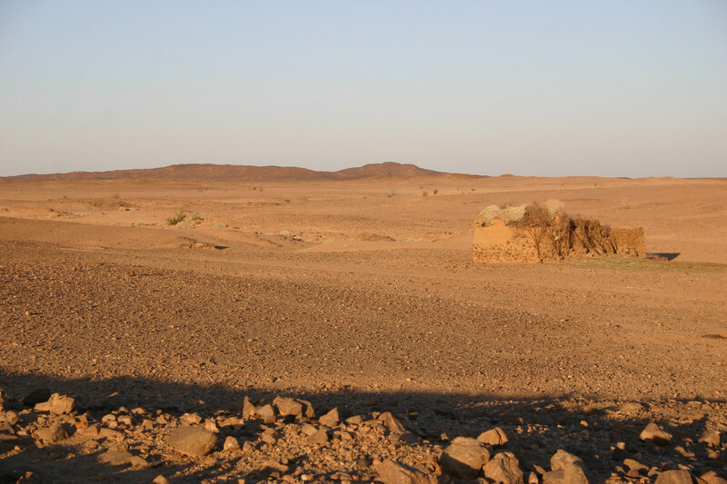 Desert landscape with hut