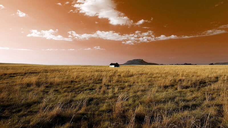 Desert landscape with hut