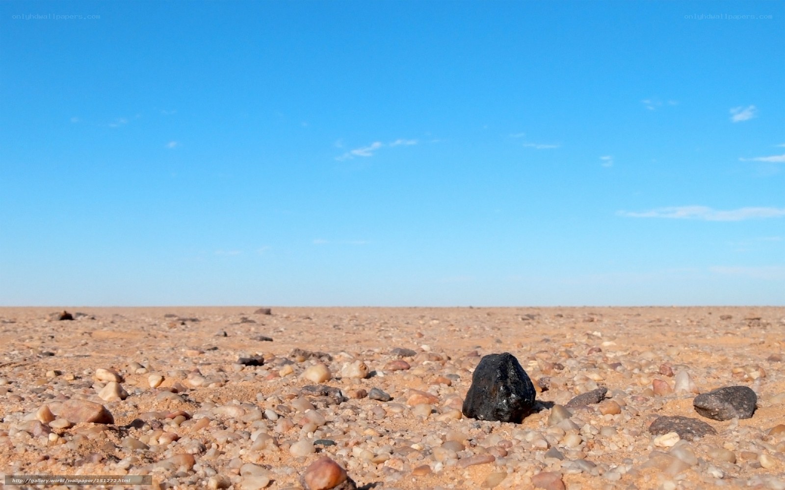 Desert landscape with meteorite